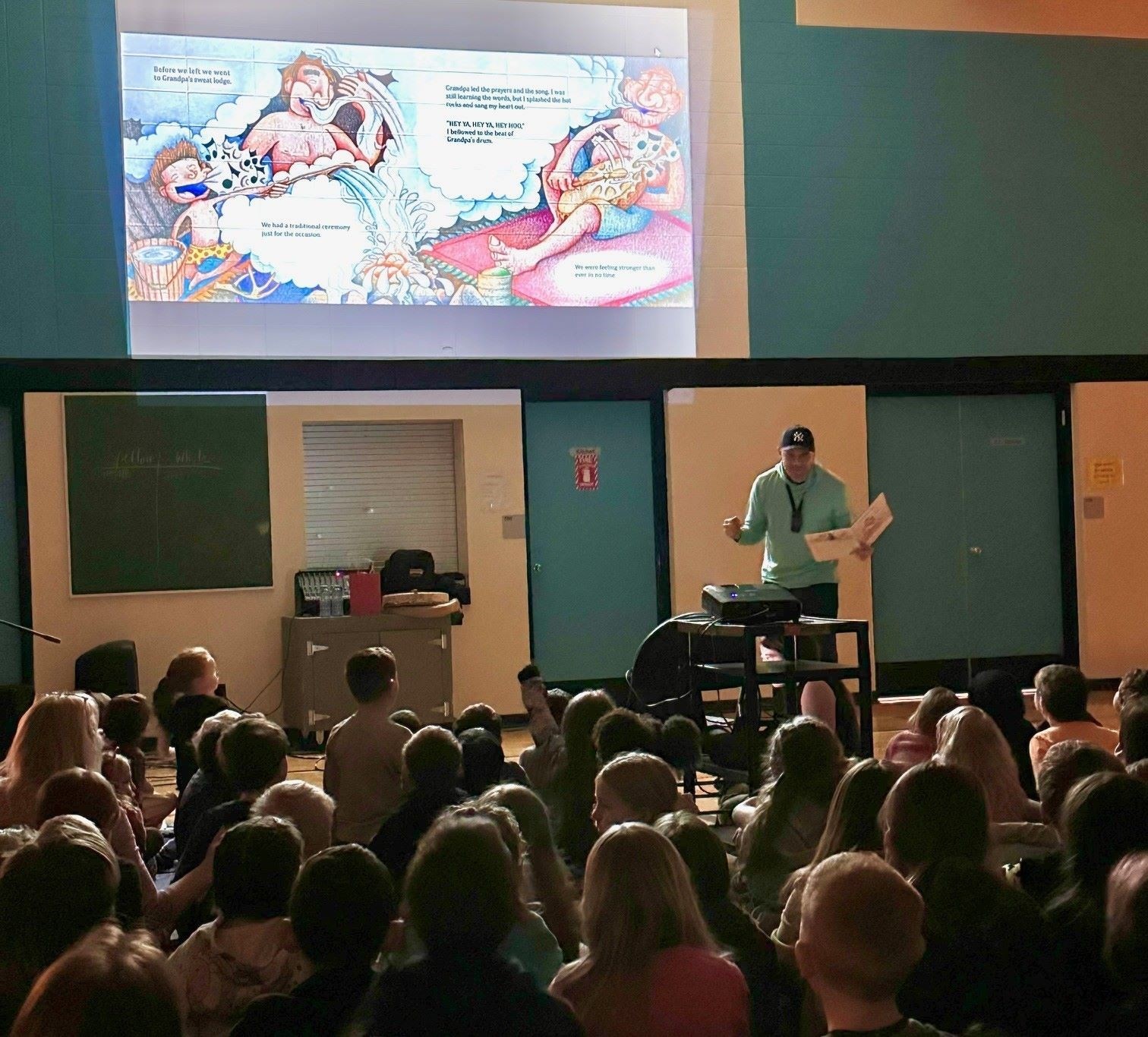 Chief Willie Sellars Entertains Horse Lake Students with His Books